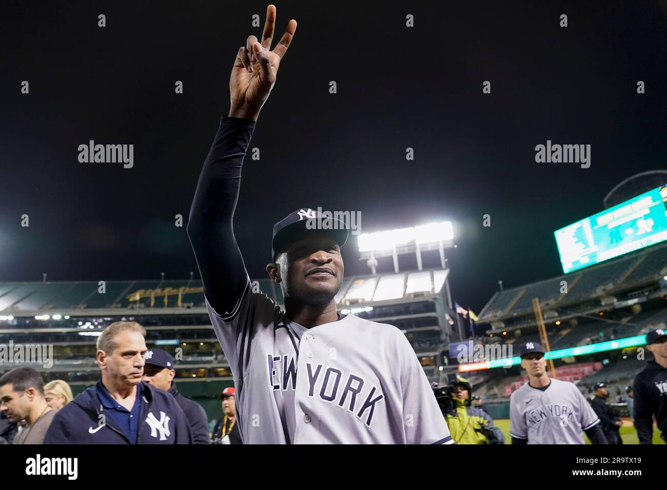 New York Yankees pitcher Domingo Germán, center, walks off the field after  his perfect game against the Oakland Athletics in a baseball game in  Oakland, Calif., Wednesday, June 28, 2023. (AP Photo/Godofredo