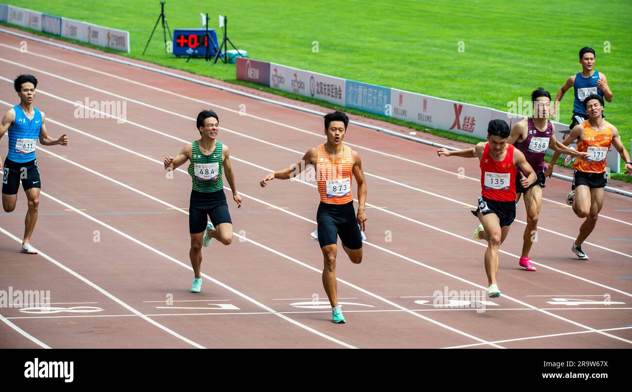 SHENYANG, CHINA - JUNE 29, 2023 - Runners compete in the men's 200m race during the Hangzhou Asian Games trials in Shenyang, Liaoning province, China, Stock Photo