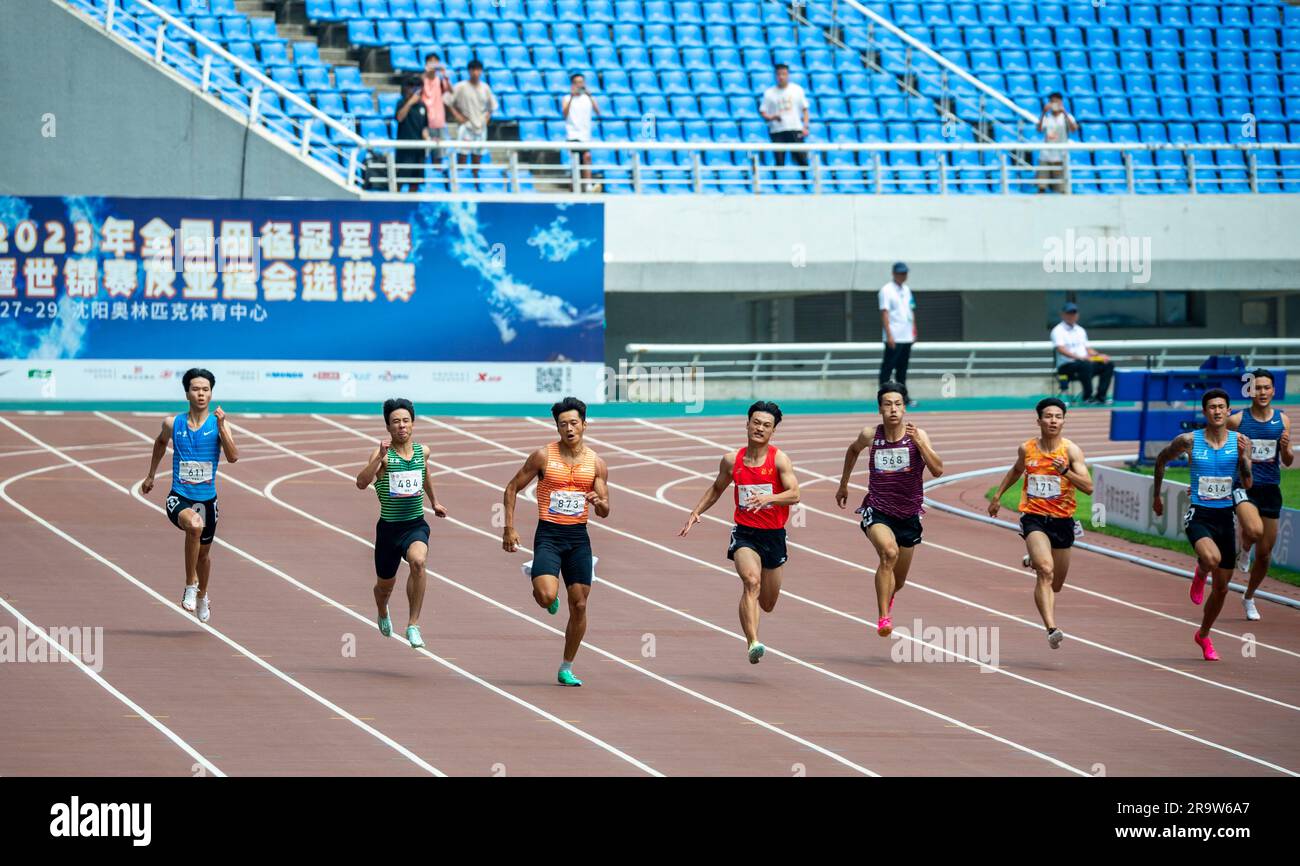 SHENYANG, CHINA - JUNE 29, 2023 - Runners compete in the men's 200m race during the Hangzhou Asian Games trials in Shenyang, Liaoning province, China, Stock Photo