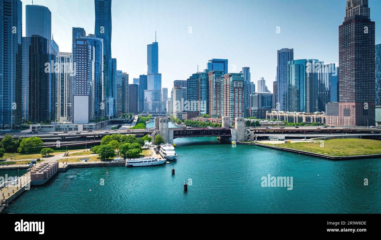 Chicago River at downtown with its iconic buildings around - aerial ...