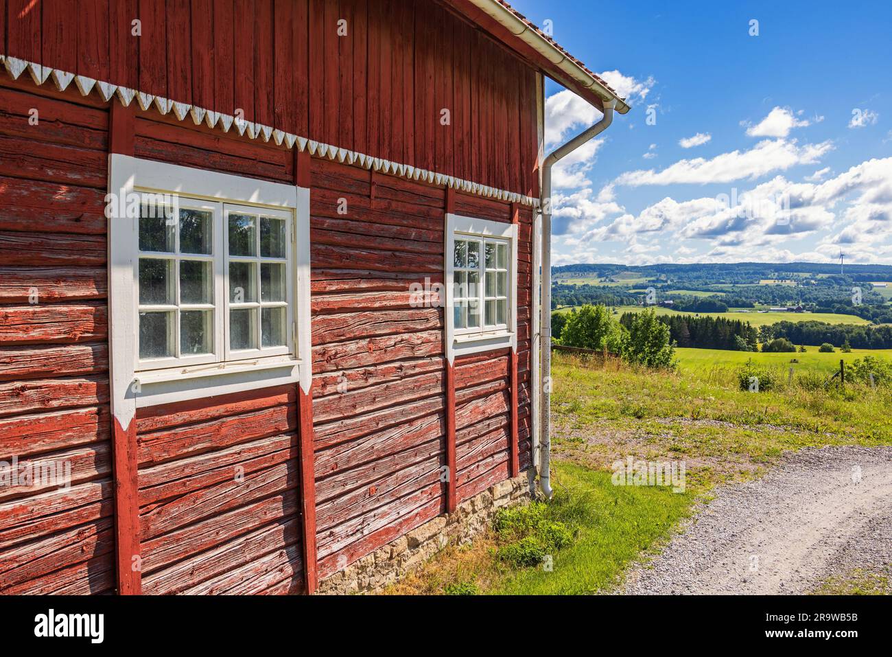 Red barn with a beautiful landscape view Stock Photo - Alamy