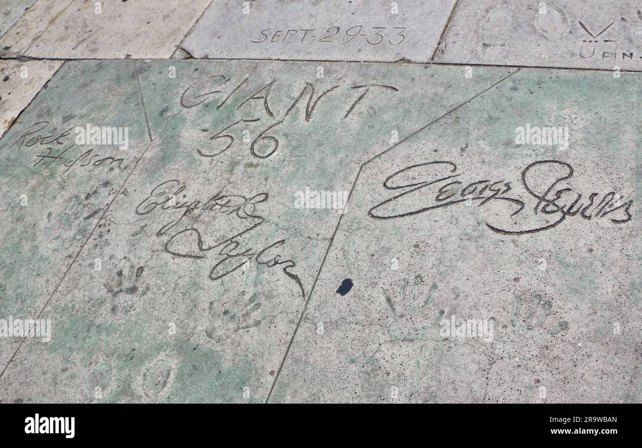Autograph hand and footprints of Rock Hudson Elizabeth Taylor and producer George Stevens Giant Chinese Theatre Hollywood Los Angeles California USA Stock Photo