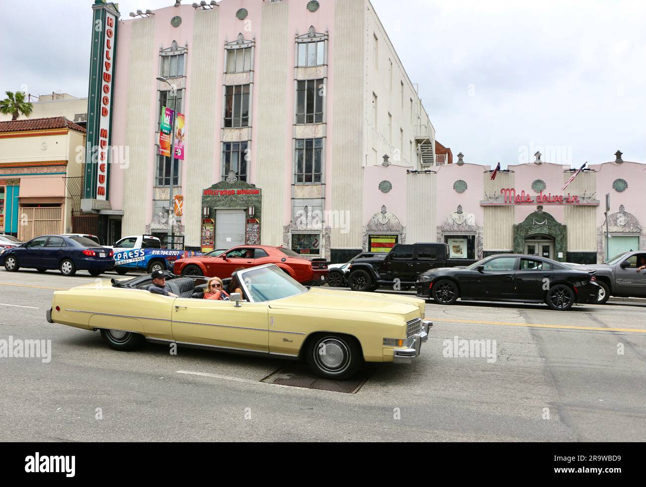 1974 Cadillac Eldorado Convertible passing the Hollywood Museum in the
