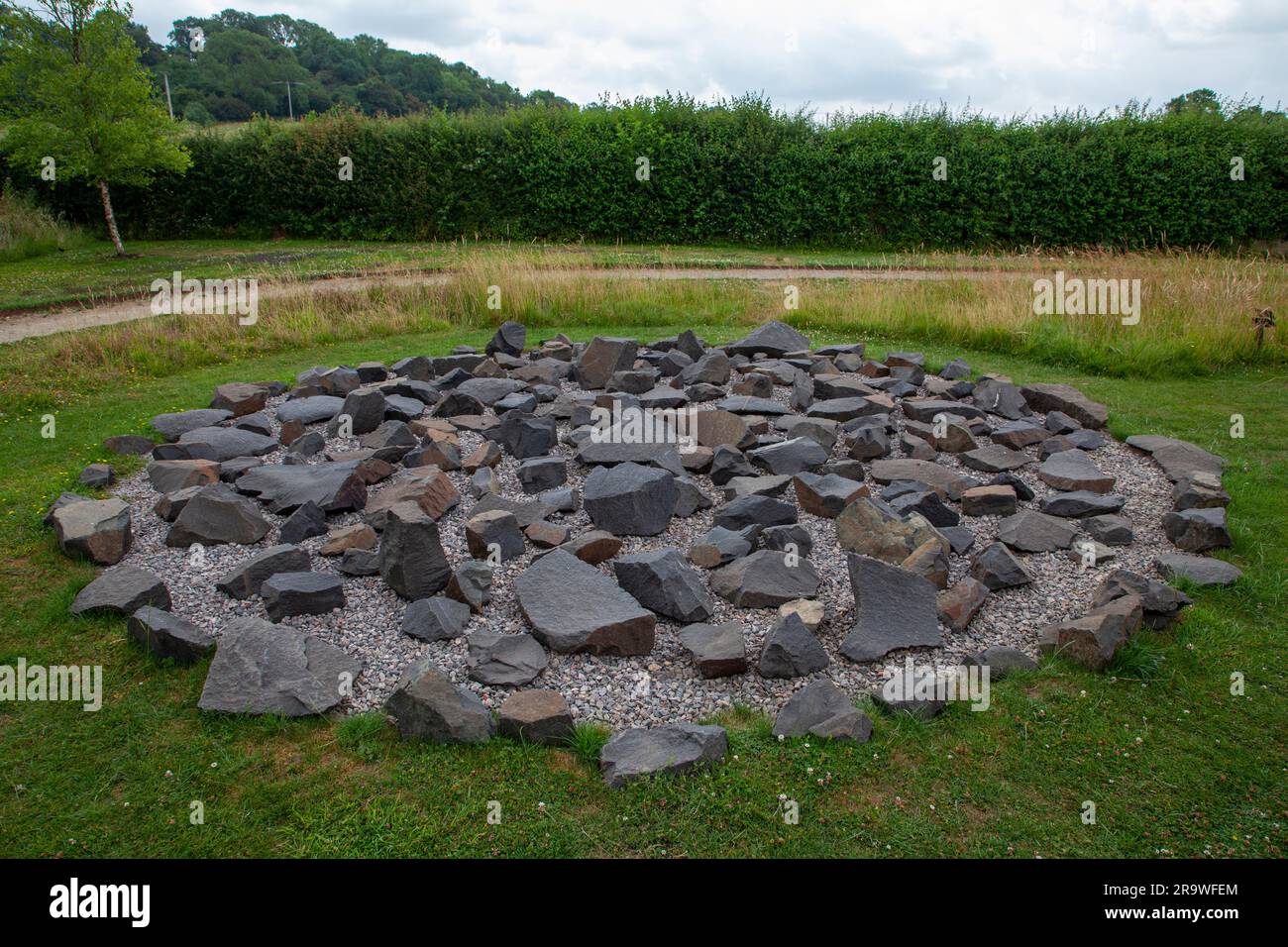 Richard Long's Stone Circle (1980) on display at Oudolf Field, Hauser and Wirth in Bruton Somerset Stock Photo