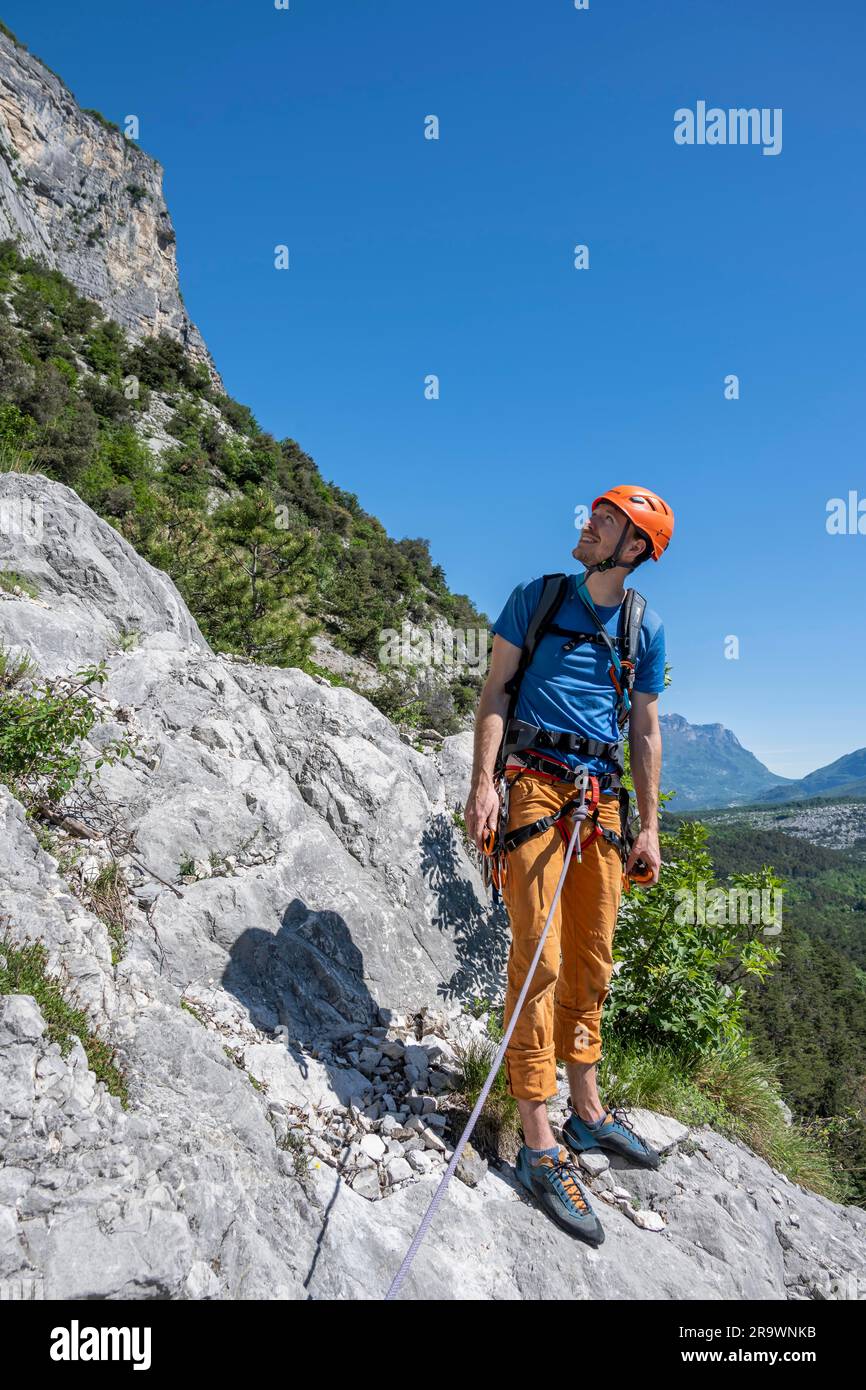 Climber on the rope, multi-pitch climbing, Via la Bellezza della Venere climbing tour, Garda Mountains, Arco, Trentino-Alto Adige, Italy Stock Photo