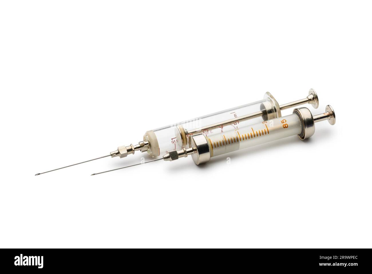 Two glass syringes isolated on white background Stock Photo Alamy
