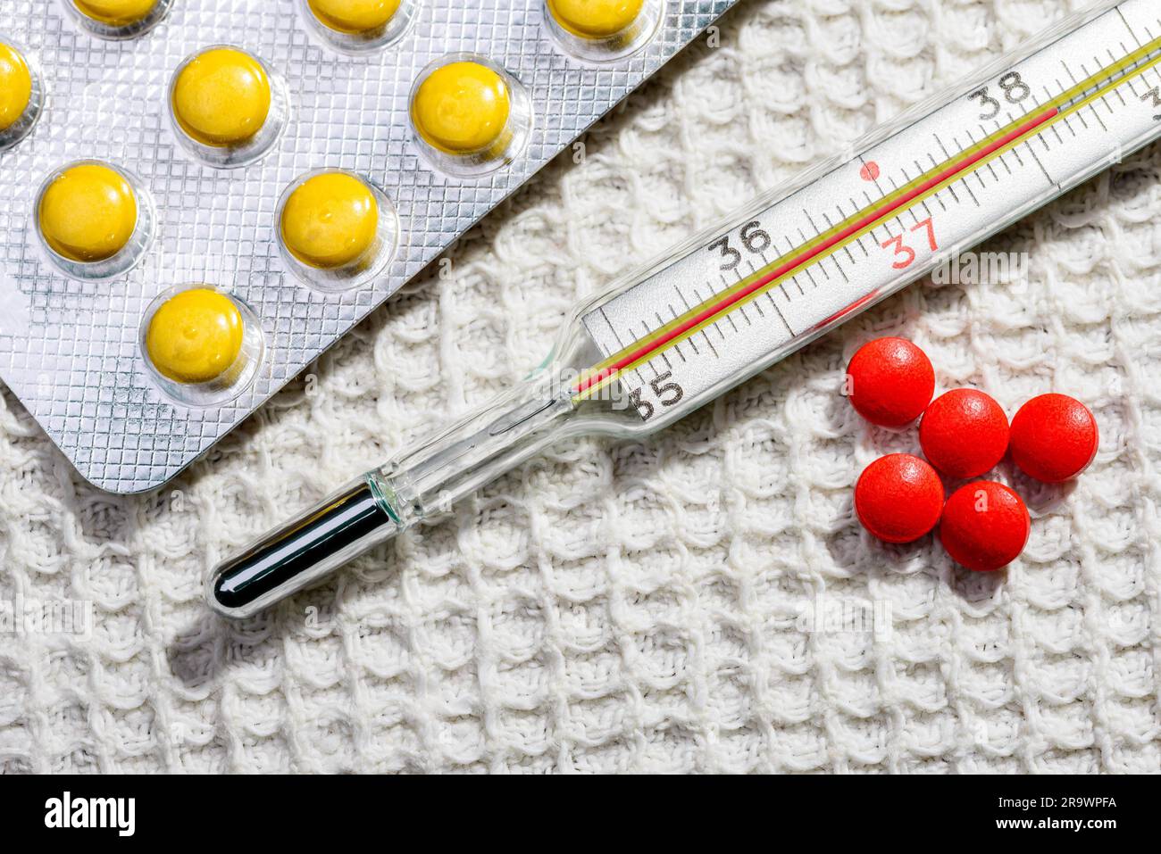 Double scale alcohol thermometer with ambient temperature plus 23 Celsius  or 73 Fahrenheit degrees. Silver plastic vertical air thermometer isolated  Stock Photo - Alamy