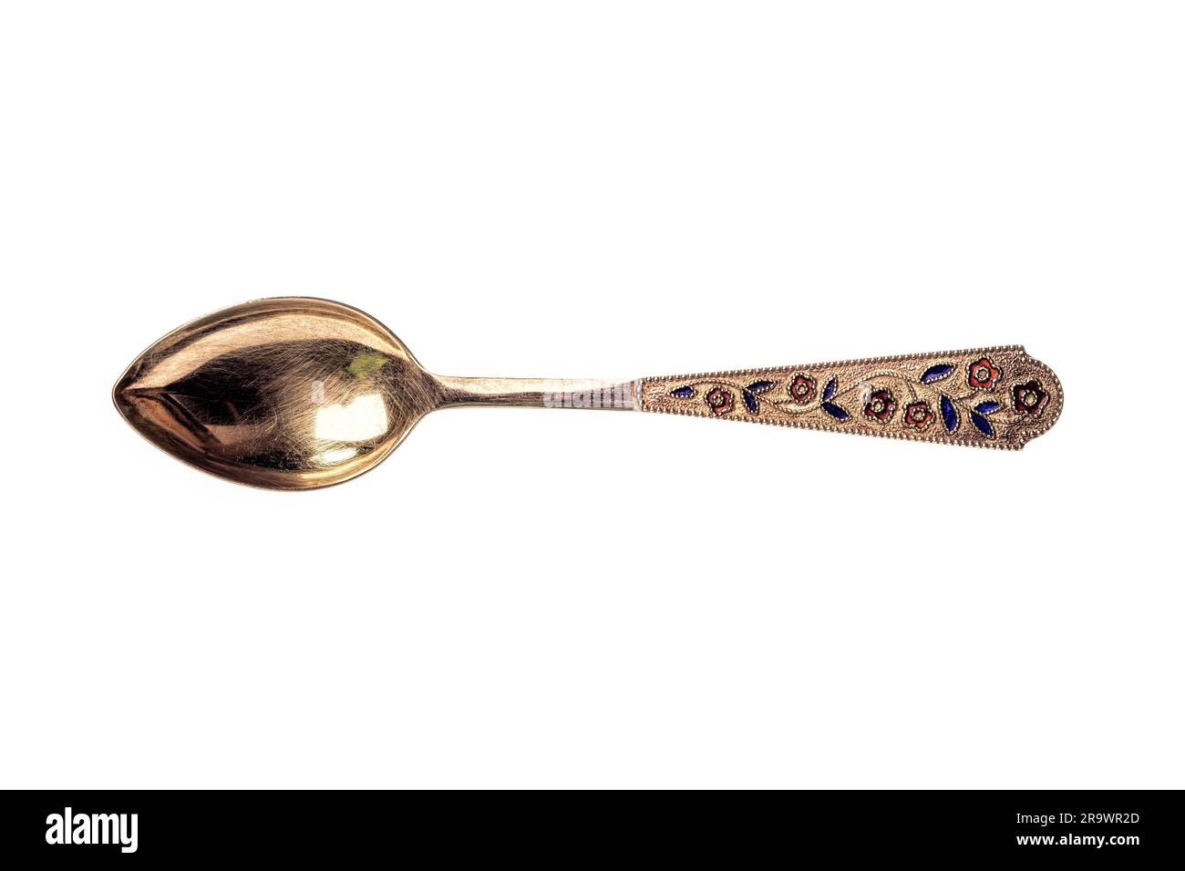 R Tea Spoon A soviet style silver decorated tea spoon isolated on white background ...