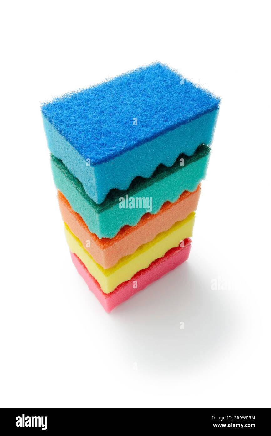 A stack of multicolored kitchen sponges isolated on white background Stock Photo