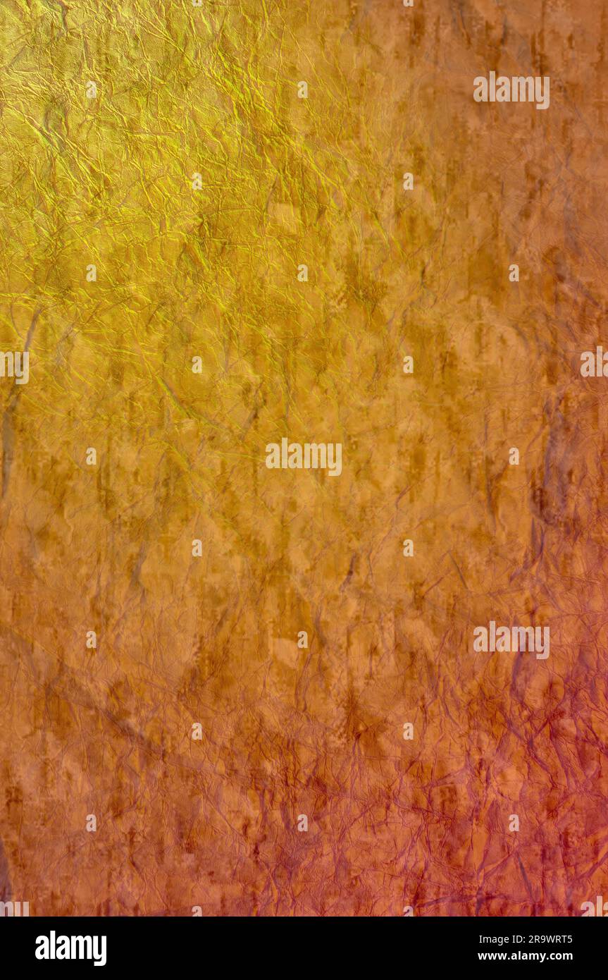 A colored crumpled orange paper texture for background use Stock Photo