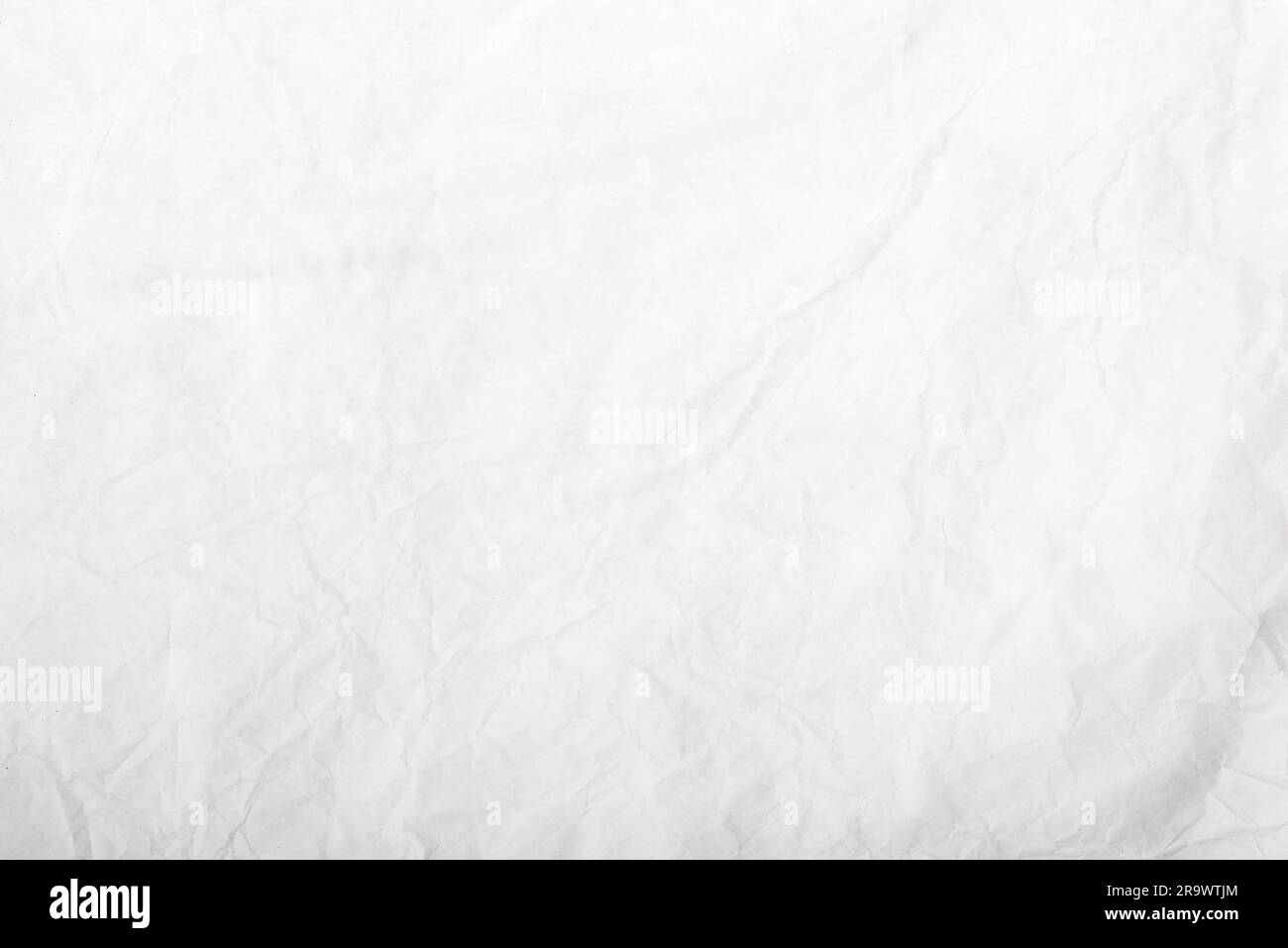 A crumpled white paper texture for background use Stock Photo - Alamy