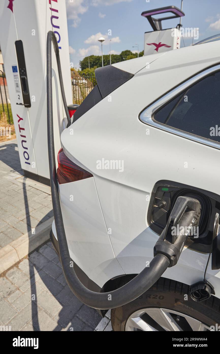 The future is here electric vehicles charging at an electric vehicle (EV) charging station
