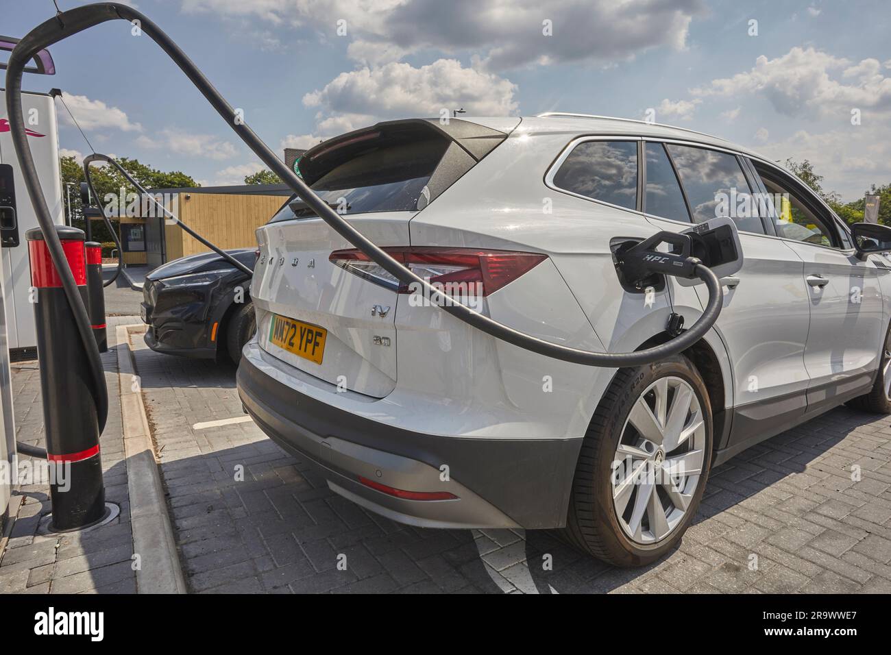 The future is here electric vehicles charging at an electric vehicle (EV) charging station