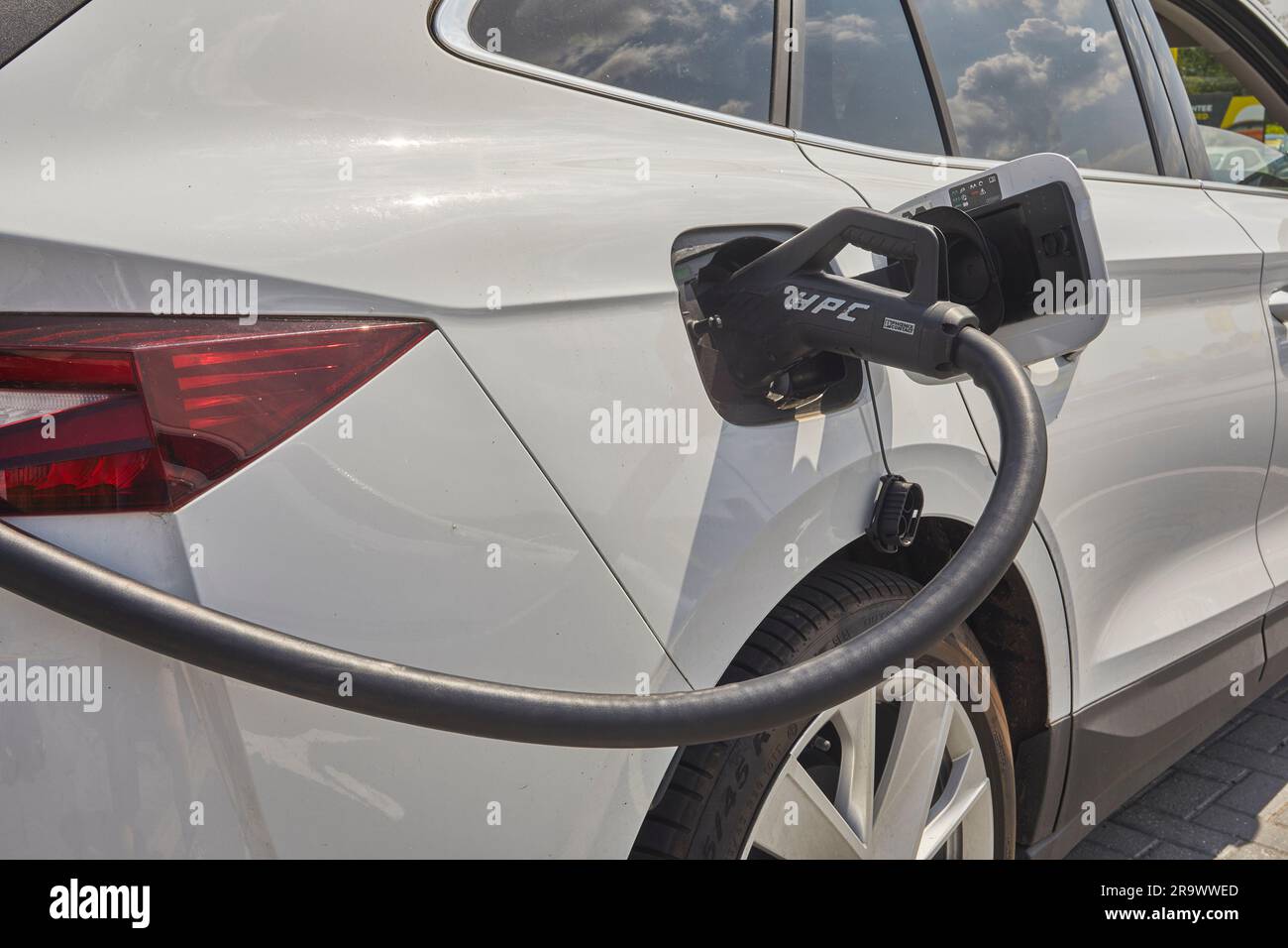 The future is here electric vehicles charging at an electric vehicle (EV) charging station