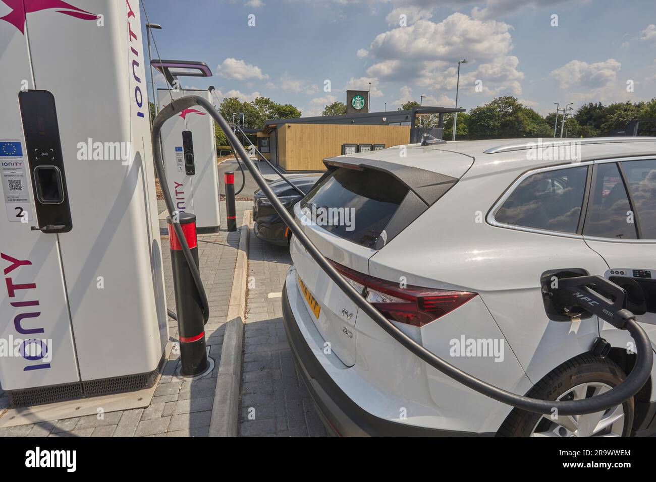 The future is here: electric vehicles charging at an electric vehicle ...