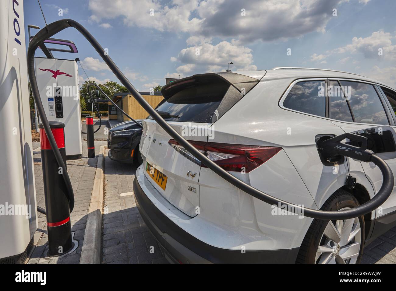 The future is here electric vehicles charging at an electric vehicle (EV) charging station