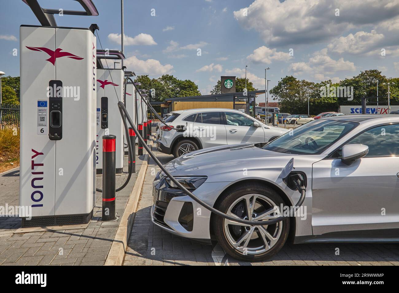 The future is here electric vehicles charging at an electric vehicle (EV) charging station