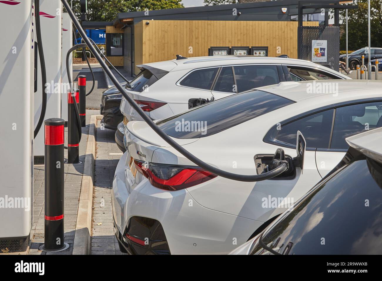 The future is here electric vehicles charging at an electric vehicle (EV) charging station