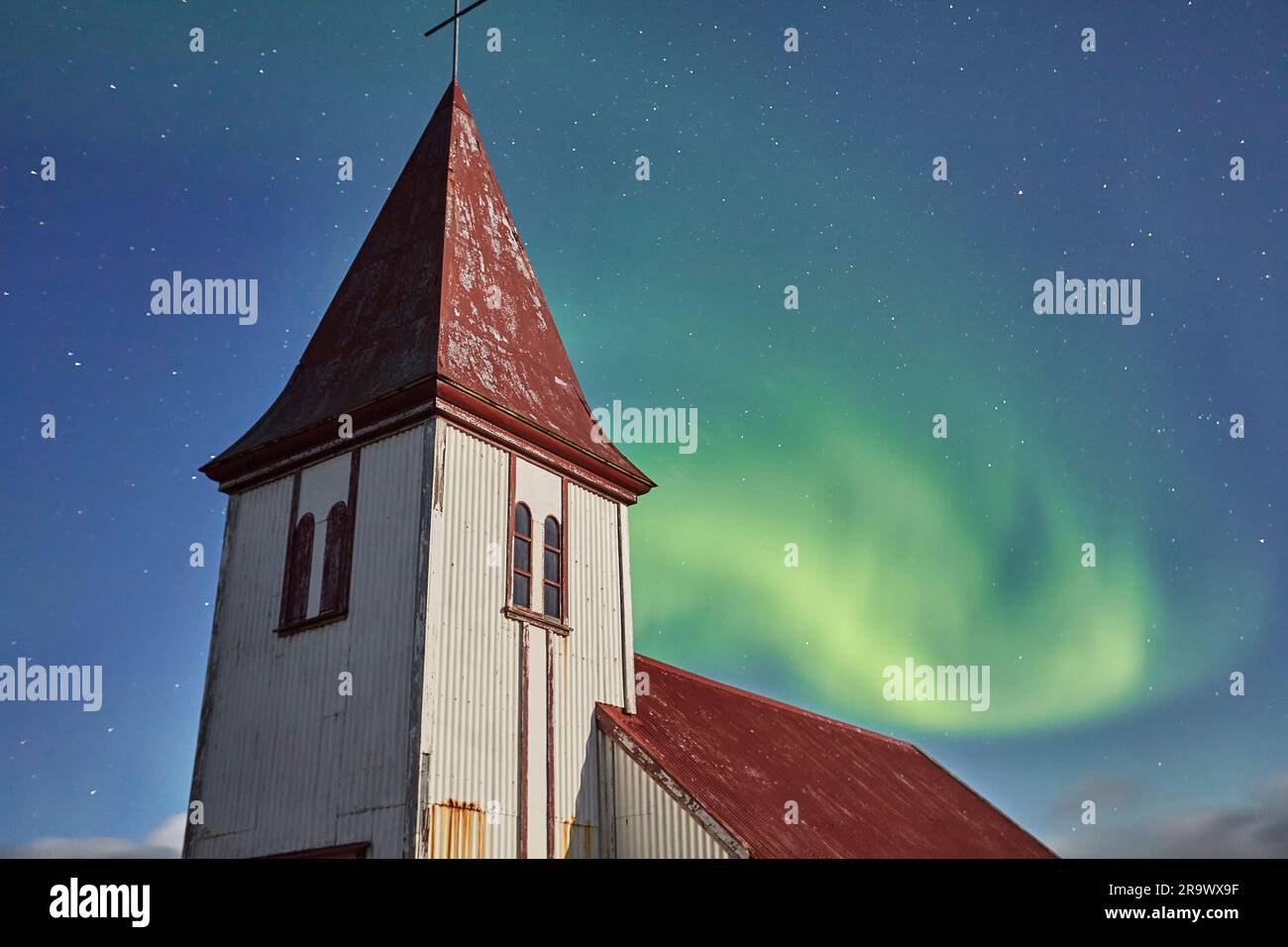 Northern Lights, Aurora borealis, over the church at Hellnar, on the Snaefellsnes peninsula, west coast of Iceland. Stock Photo