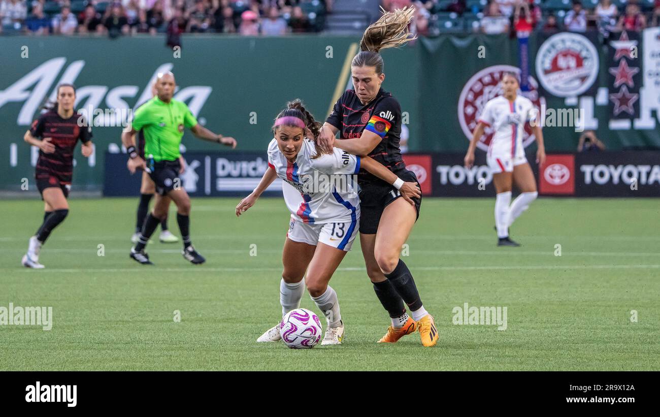 Portland, USA. 28th June, 2023. Seattle's Marley Canales and Portland's Sam Coffey battle for possession in the Seattle OL Reign's 1-0 win over the Portland Thorns in the NWSL Challenge Cup in Providence Park, Portland, Oregon, on June 28, 2023 (Photo by Jeff Wong/Sipa USA) Credit: Sipa USA/Alamy Live News Stock Photo