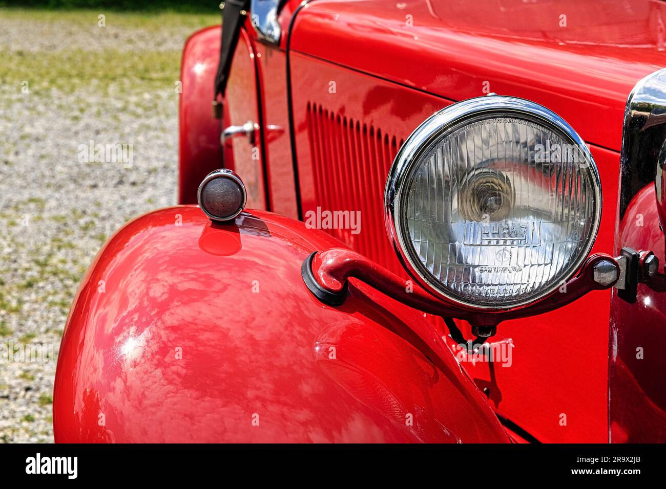 Red MG convertible, English classic car, detail with headlight, Hoexter, Germany Stock Photo