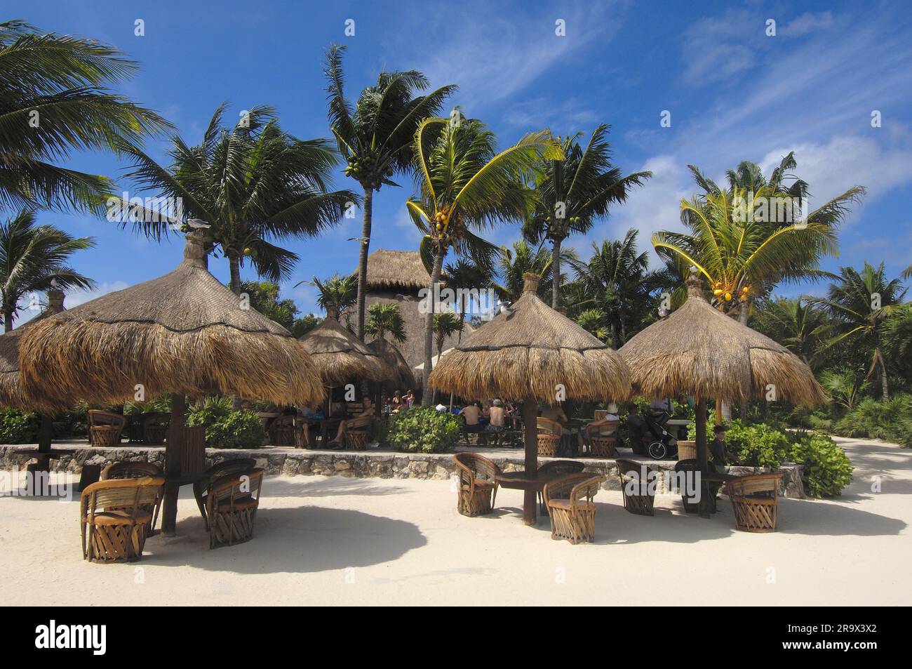 Beach umbrellas and chairs, beach area, Xcaret Eco Park, near Playa del Carmen, Riviera Maya, Quintana Roo, Yucatan, Mexico, Yucatan Stock Photo