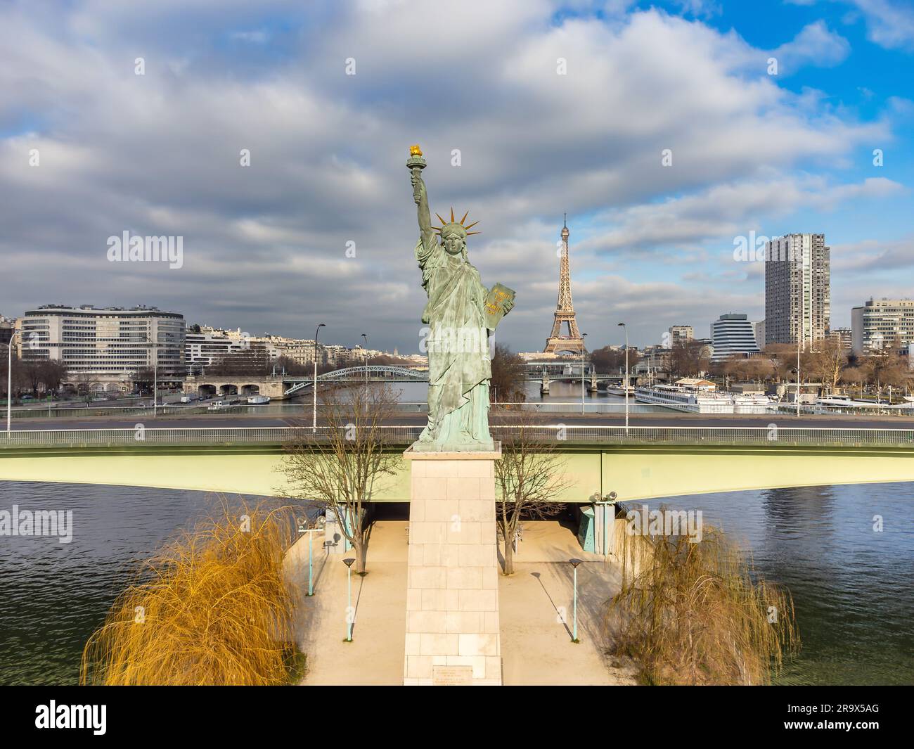 Aerial drone view of the the Statue of Liberty of Paris, France, with The Eiffel Tower in the background Stock Photo