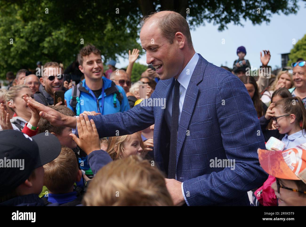 The Prince of Wales with school children as he attends the Royal Norfolk Show at the Norfolk Showground in Norwich. Picture date: Thursday June 29, 2023. Stock Photo