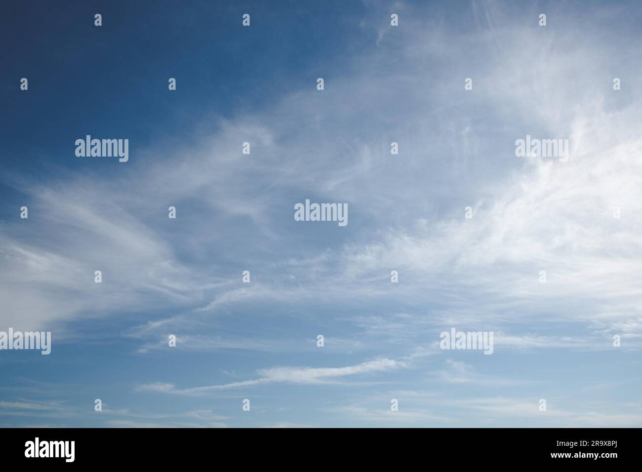 Blue sky with soft white clouds in the summer Stock Photo - Alamy
