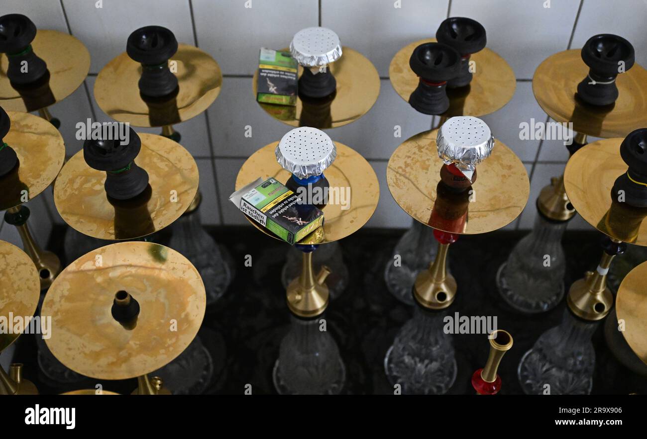 Sindelfingen, Germany. 29th June, 2023. Shisha water pipes stand in a