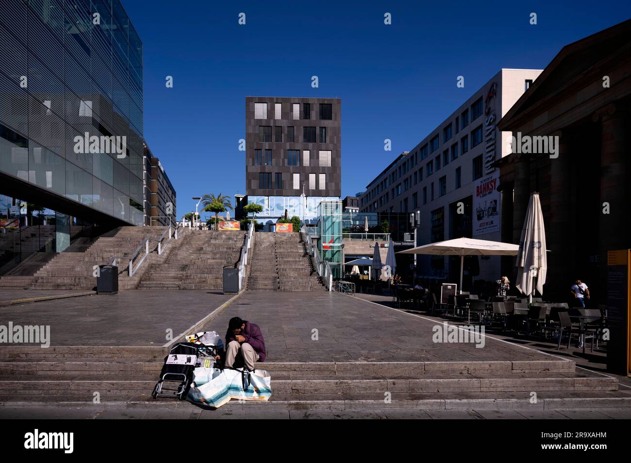 Obachloser, Berber, sitting on steps, Kleiner Schlossplatz, Stuttgart, Baden-Wuerttemberg, Germany Stock Photo