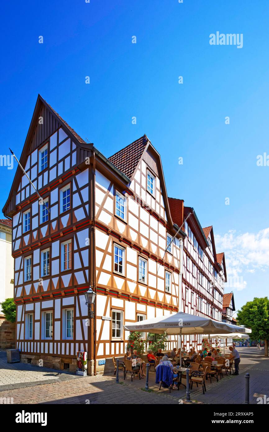 Half-timbered house, magnificent, outdoor seating with people, Marktstr. 34, old town, district town, Eschwege, Werra-Meissner Kreis, North Hesse Stock Photo