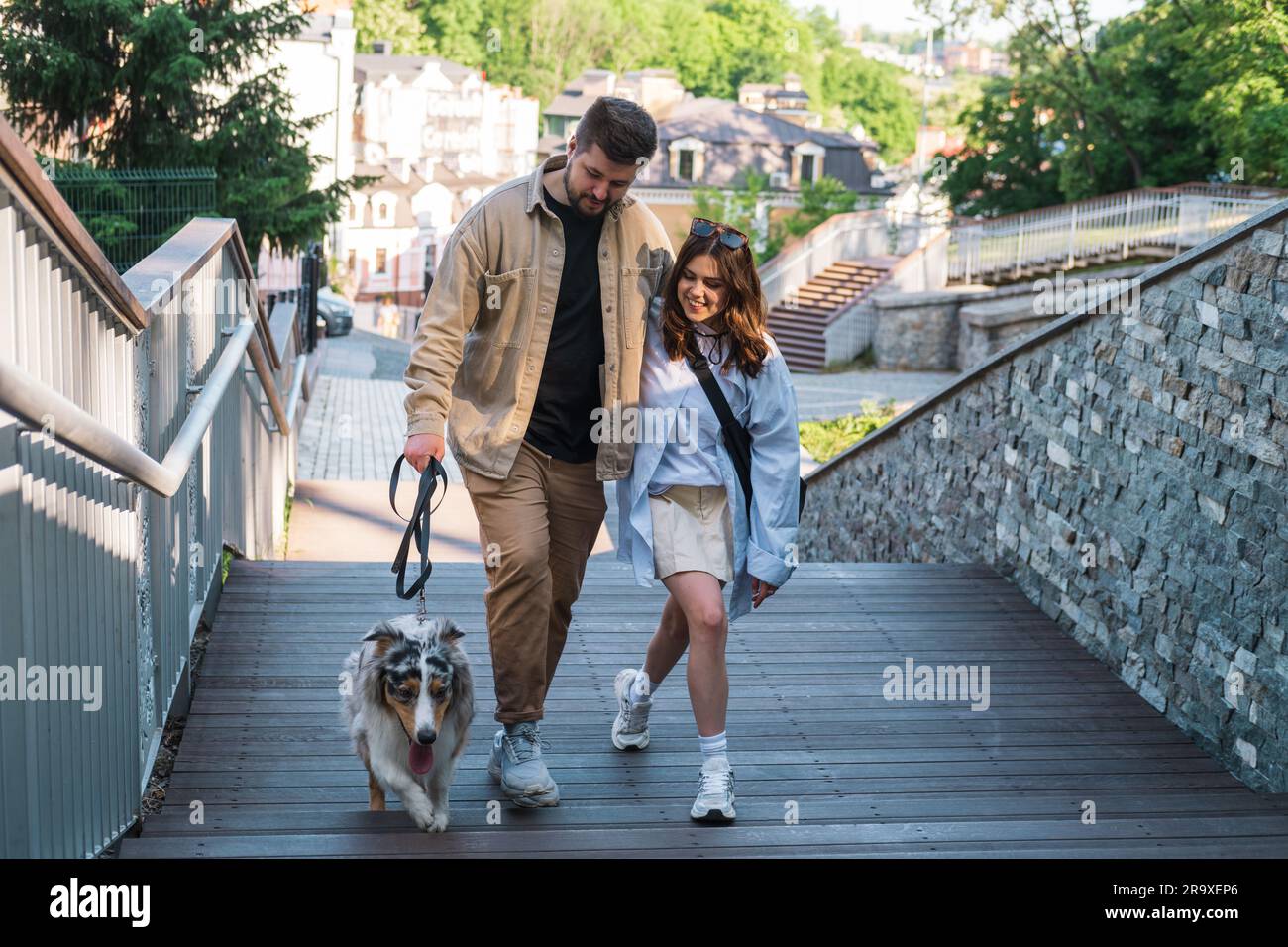 Man woman walk stairs hi-res stock photography and images - Alamy