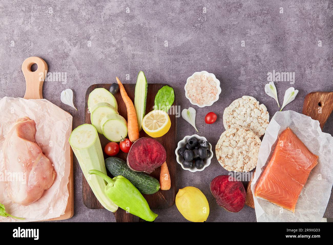 Aesthetics vegetables, chicken fillet, olives, salmon and greens top