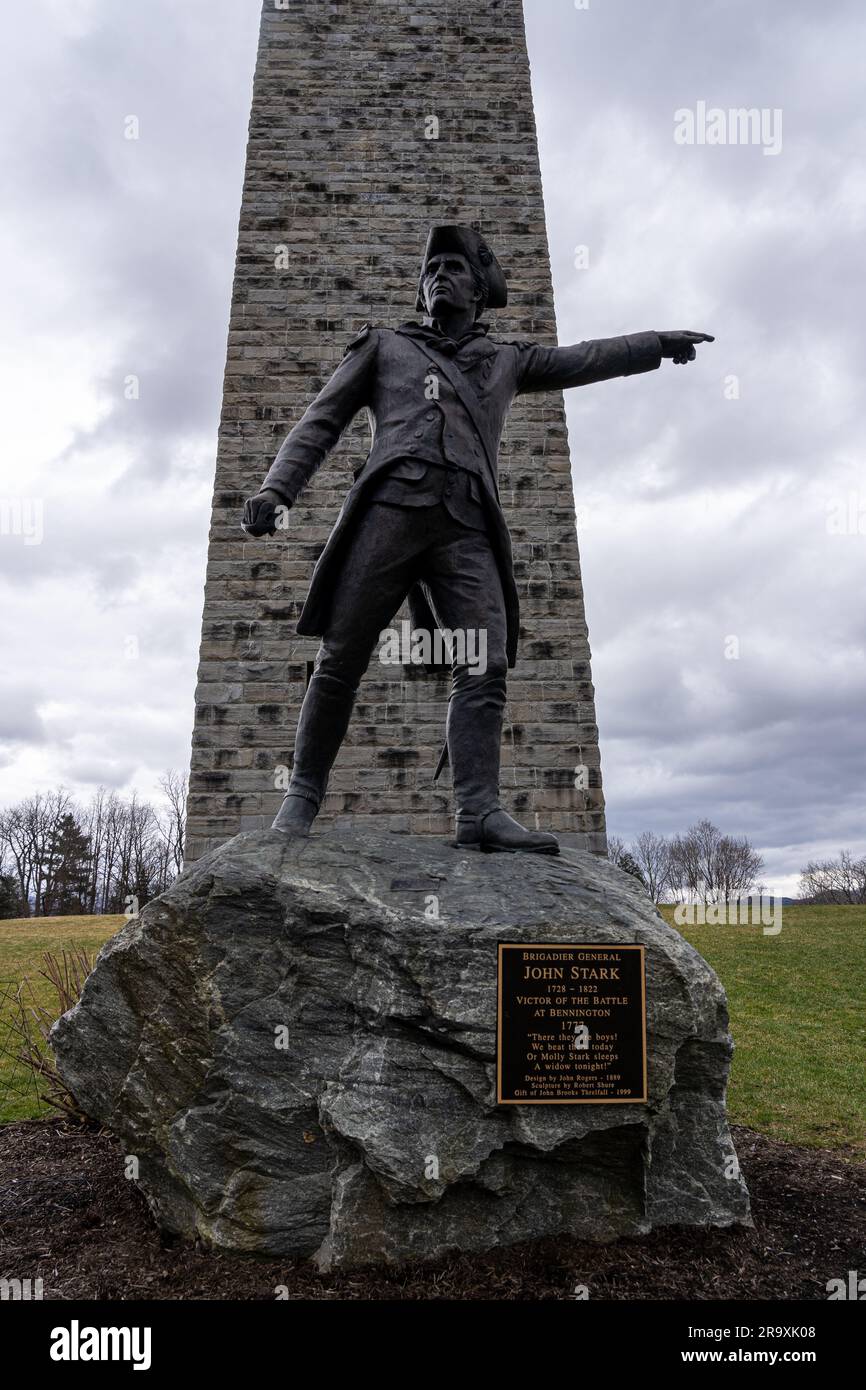 A monument of John Stark stands atop a large rock in the USA, with a plaque honoring the American Revolutionary War hero Stock Photo