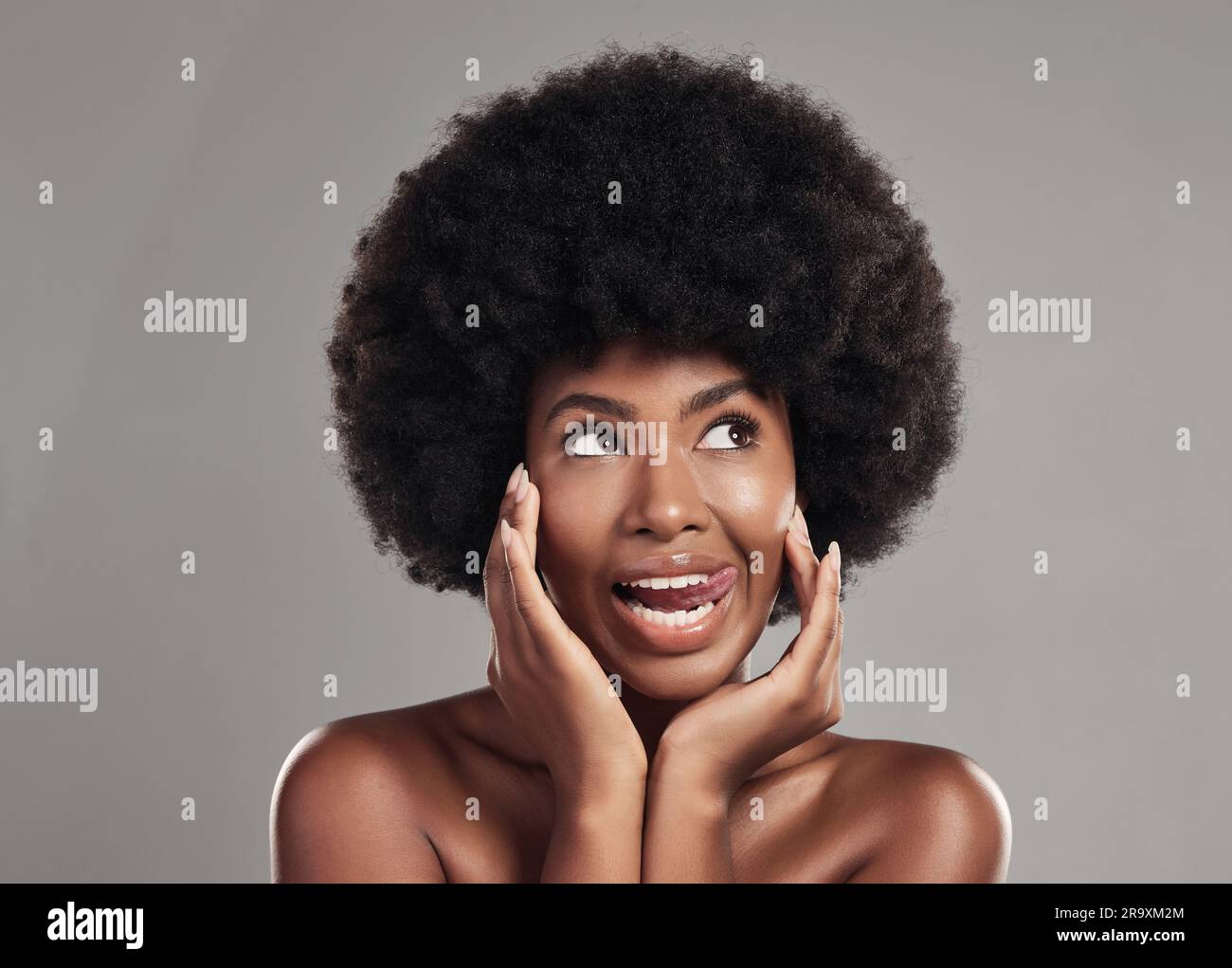 Black woman, face and tongue out for skincare in studio isolated on a ...