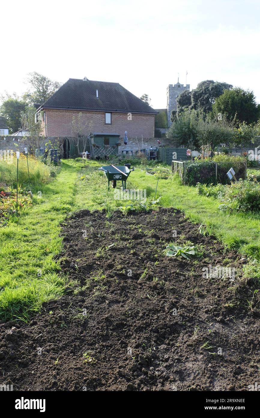 Freshly tilled bed on allotment in late autumn Stock Photo