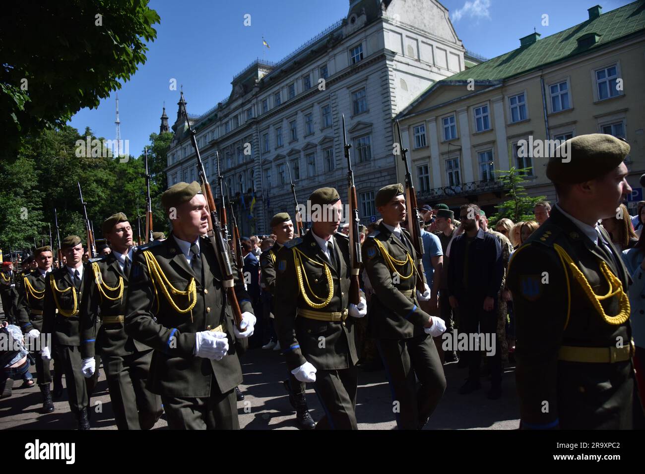 Cadets from the honor guard march during the celebration of the Constitution Day of Ukraine. Ukraine celebrated the 27th anniversary of the adoption of the country's basic law - the constitution. In the conditions of the Russian-Ukrainian war, official events were very short. In Lviv, the Ukrainian flag was raised, honor guard marched, and a military band performed. (Photo by Pavlo Palamarchuk / SOPA mages/Sipa USA) Stock Photo