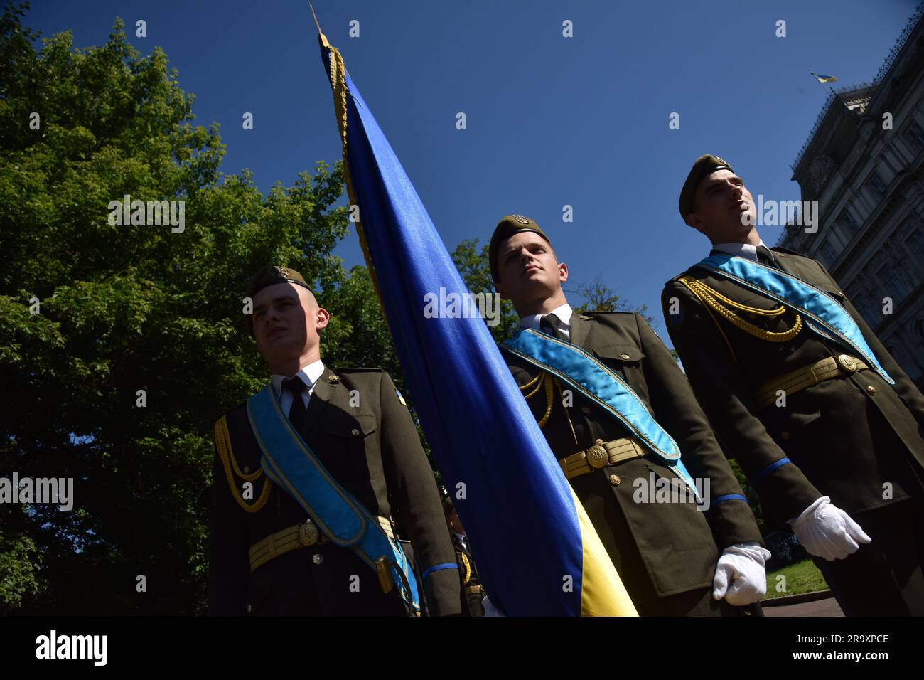Cadets from the honor guard during the celebration of the Constitution Day of Ukraine. Ukraine celebrated the 27th anniversary of the adoption of the country's basic law - the constitution. In the conditions of the Russian-Ukrainian war, official events were very short. In Lviv, the Ukrainian flag was raised, honor guard marched, and a military band performed. (Photo by Pavlo Palamarchuk / SOPA mages/Sipa USA) Stock Photo