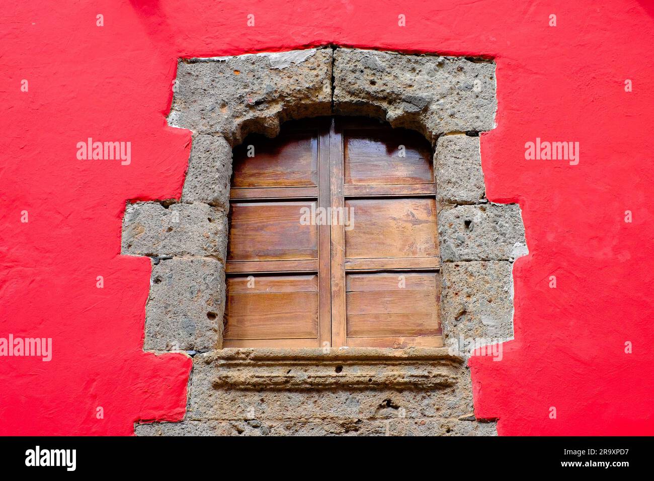 Old house, a red wall and a closed window Stock Photo - Alamy