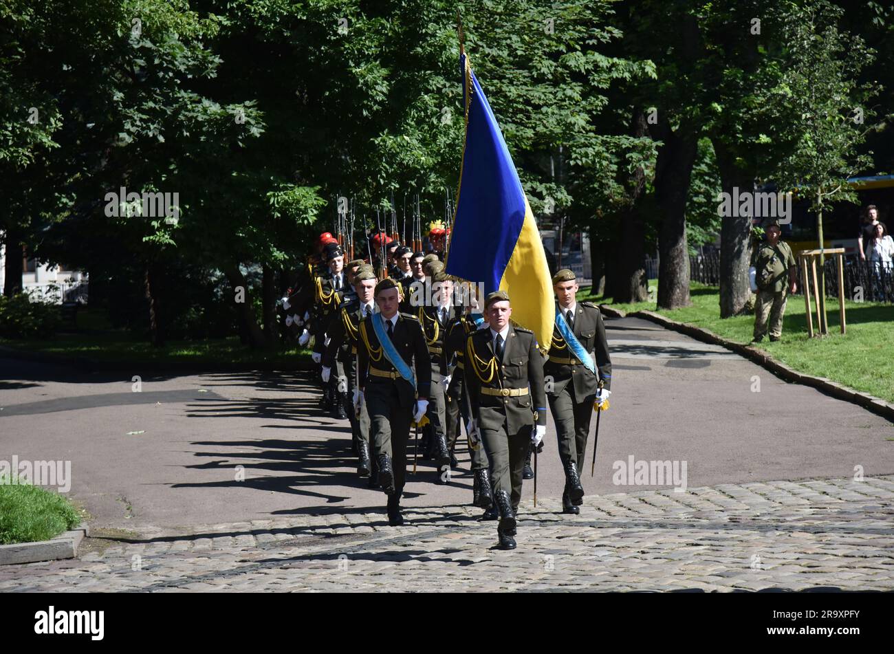 Cadets from the honor guard march during the celebration of the Constitution Day of Ukraine. Ukraine celebrated the 27th anniversary of the adoption of the country's basic law - the constitution. In the conditions of the Russian-Ukrainian war, official events were very short. In Lviv, the Ukrainian flag was raised, honor guard marched, and a military band performed. (Photo by Pavlo Palamarchuk / SOPA mages/Sipa USA) Stock Photo