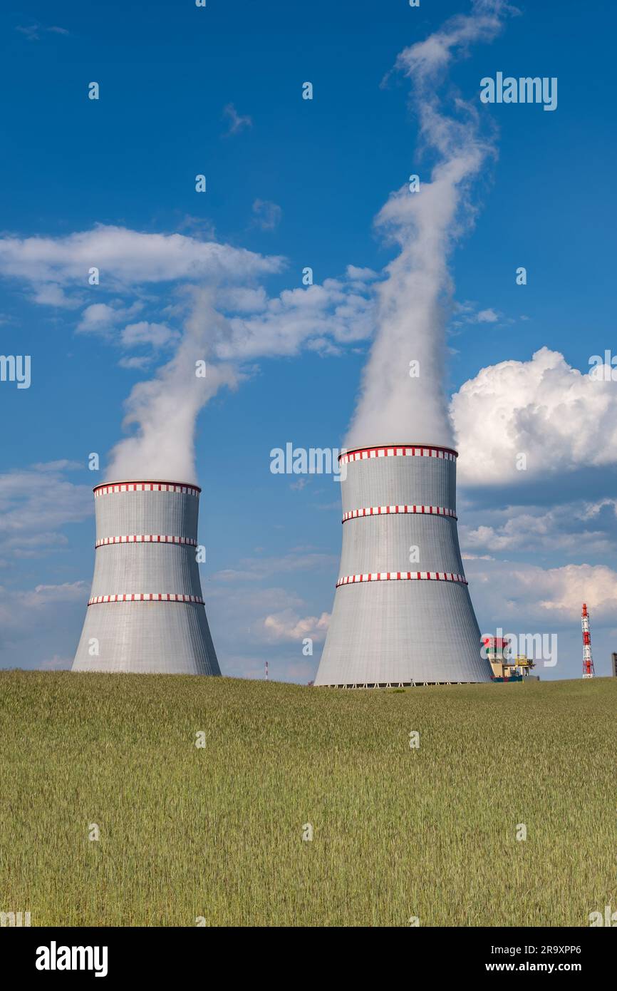 Cooling towers of nuclear power plant against the blue sky Stock Photo ...