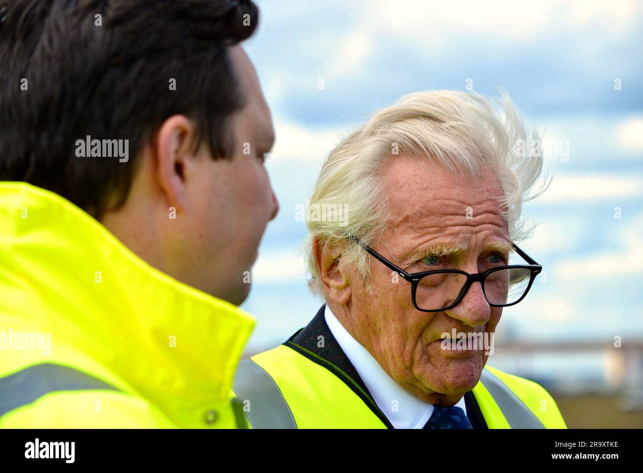 Redcar, UK. 29 Jun 2023. Lord Michael Heseltine pictured after detonating the final scheduled explosive blowdown on the Teesworks site today. This saw the former Redcar Steelworks Power Station and associated structures demolished - including a triple flare stack, the power station building, chimney, and gas holder, making way for redevelopment. Lord Michael Heseltine pressed the button to trigger the explosive demolition. Tees Valley Mayor Ben Houchen and Redcar MP Jacob Young were also present. The site is part of the Teesside Freeport and is currently being redeveloped, making way for new i Stock Photo