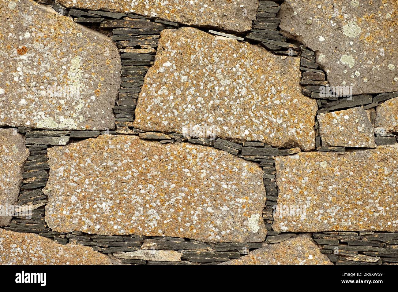 Large section of hand laid sandstone wall, dry wall construction