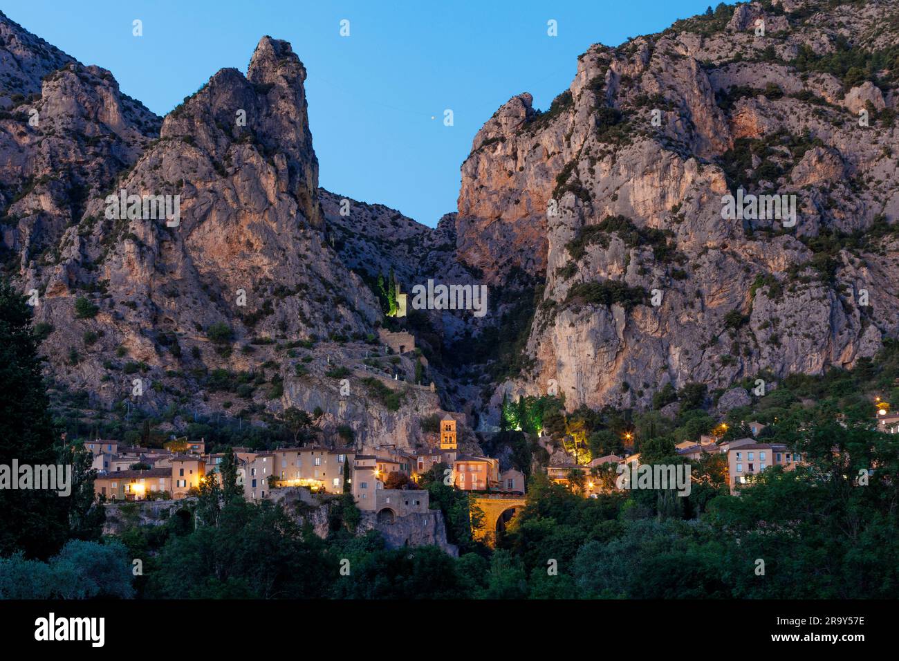 Twilight view of Moustiers-Sainte-Marie Riez Digne-les-Bains Alpes-de-Haute-Provence Provence-Alpes-Cote d’Azur France Stock Photo