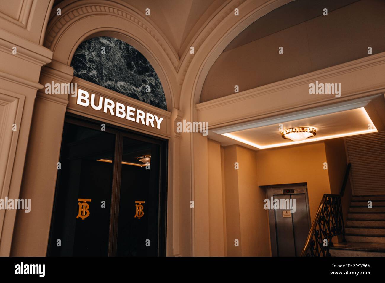 Beige classy aesthetic facade of Burberry boutique . Burberry is a British luxurious clothing brand Stock Photo