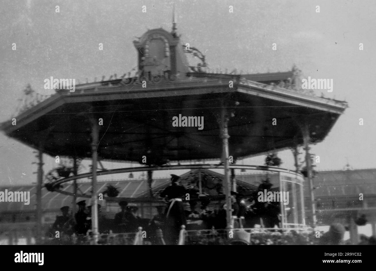 The bandstand, Clacton Pavillion, with musicians performing. Photo from a family album of snapshot images mainly taken in the UK, during the 1920s. The family lived in Witley, Surrey, and had some links to the military. Stock Photo