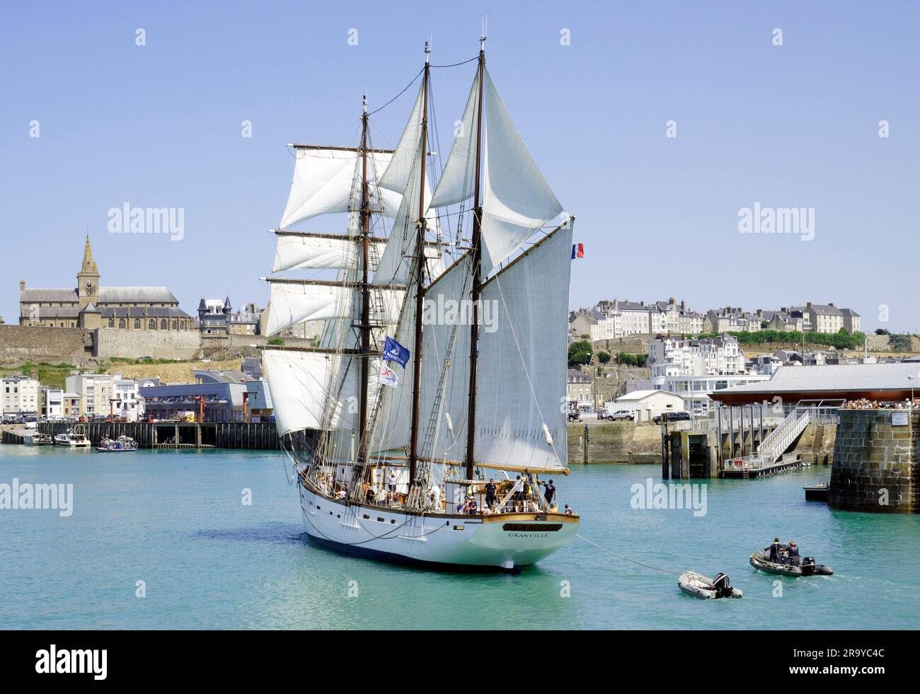 The schooner Marité in front of Granville harbour entrance. Celebration of the centenary of the schooner Marité in Granville. Manche, Normandy, France. Stock Photo