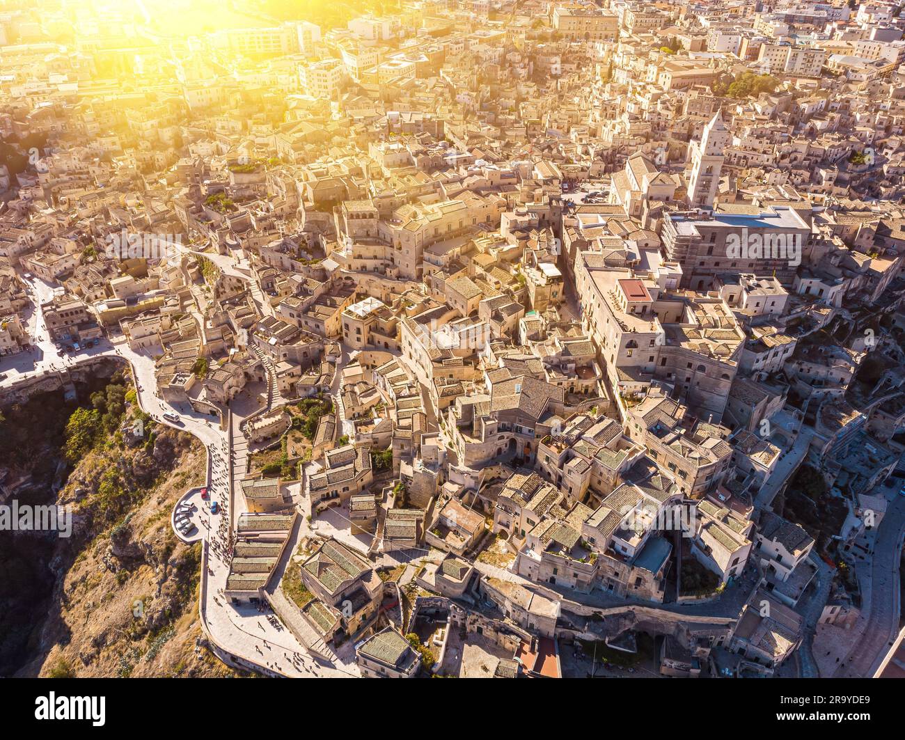 Aerial view of medieval city of Matera Sassi di Matera in beautiful golden morning light at sunrise. Birds view of Sassi di Matera, in Basilicata, sou Stock Photo