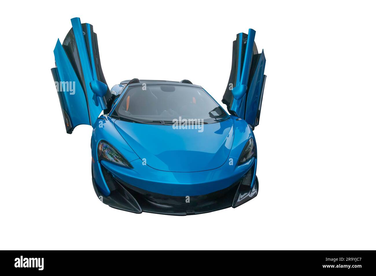 Isolation on a white background of a blue sports car with raised doors Stock Photo